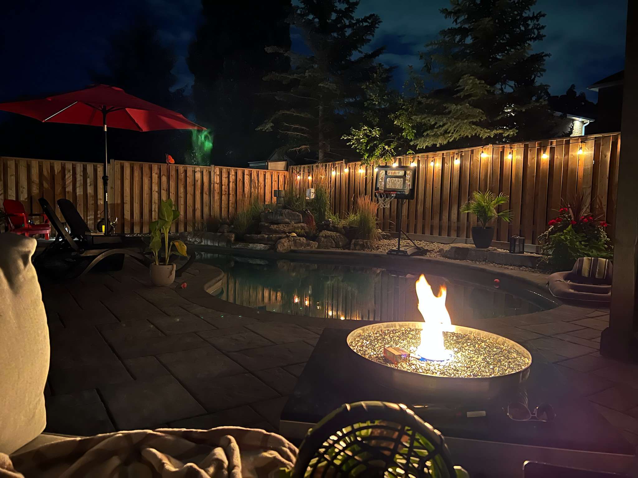 Patio and wood fence with firepit