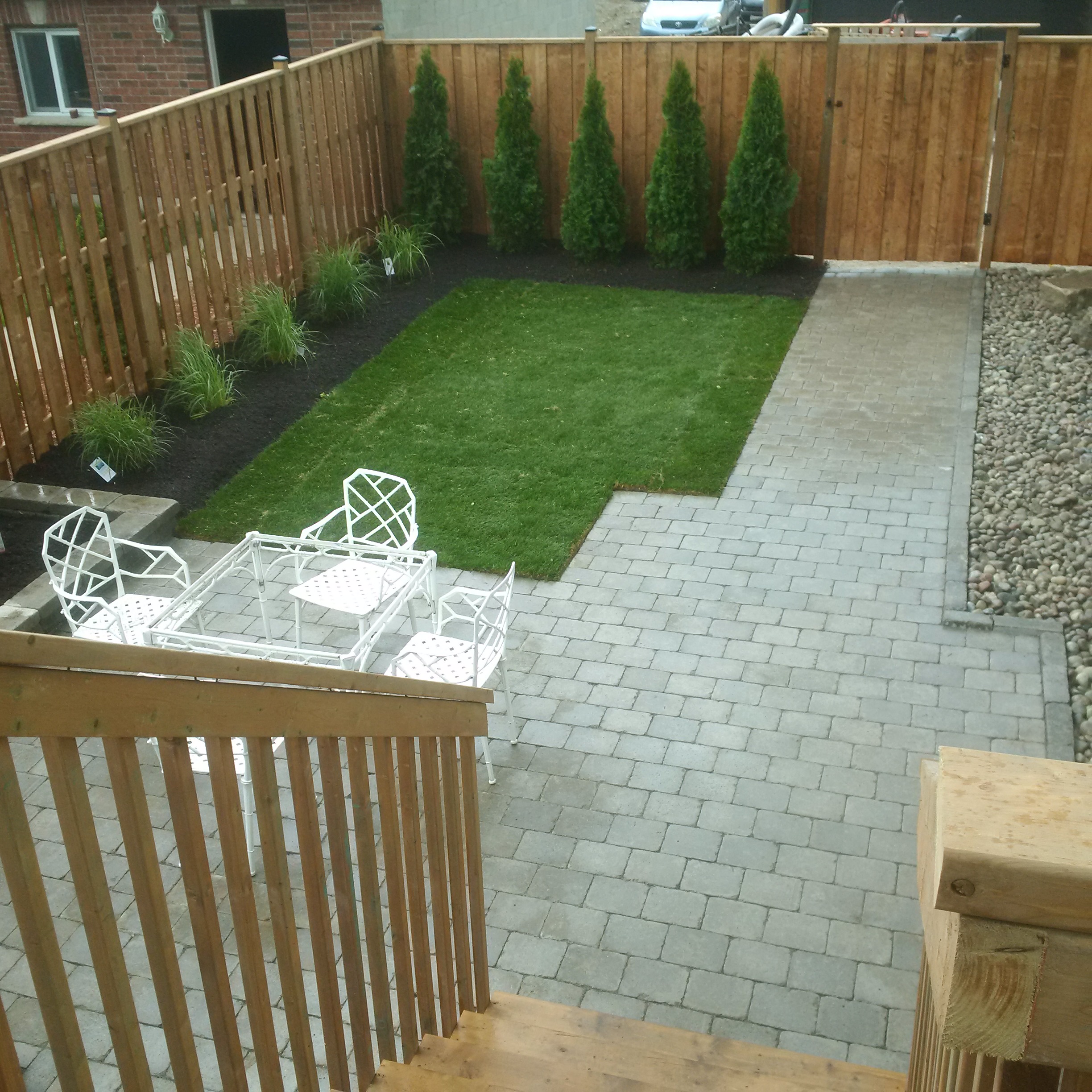 deck and interlocking stone patio With Landscape Caledon, Ontario